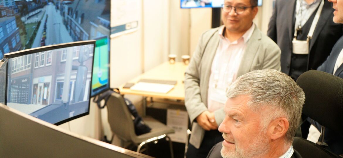 The remote driving simulator at 5G-Blueprint's booth at EuCNC